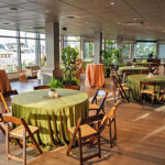 web-dockside-venue-indoor-green-tablecloth